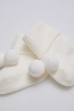 Calcetines canalé con borlas recién nacido<Ysabel Mora Sale