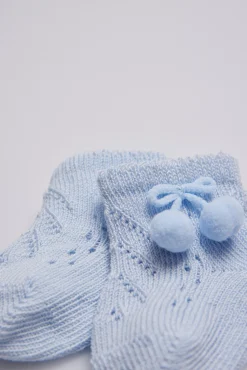 Calcetines perlé con borlas recién nacido<Ysabel Mora New