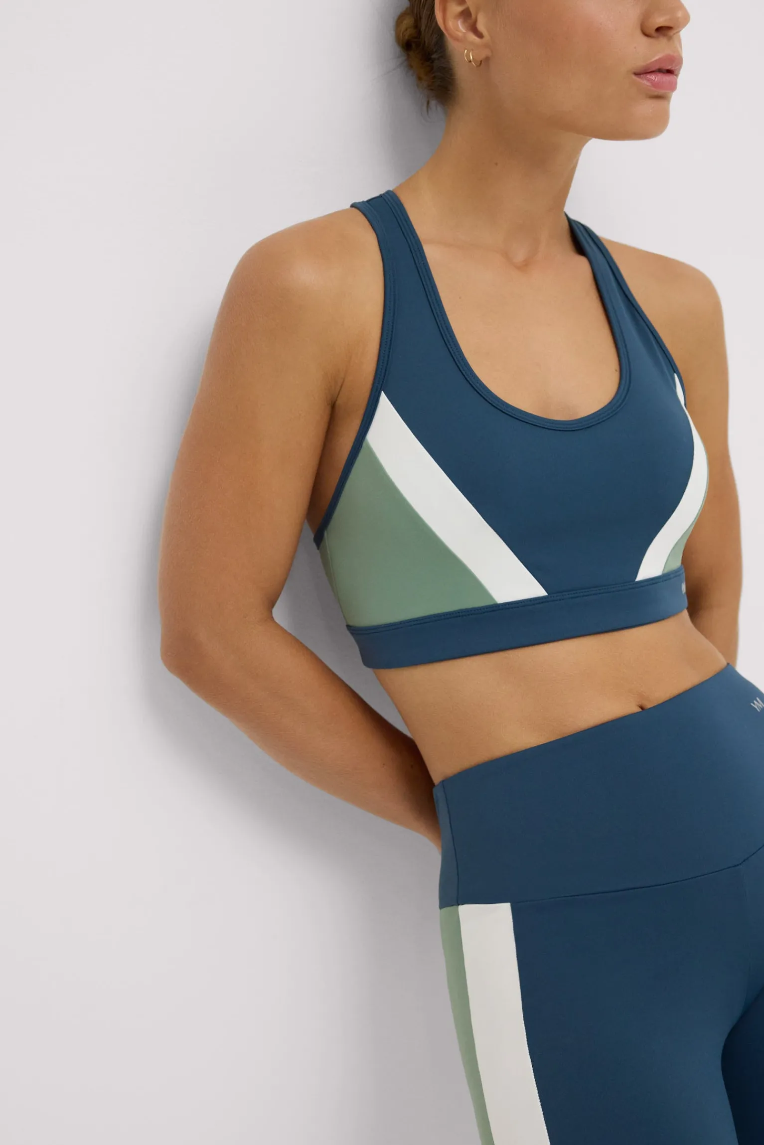 Sujetador deportivo color block con relleno extraíble<Ysabel Mora